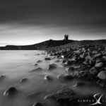 dunstanburgh castle balck and white